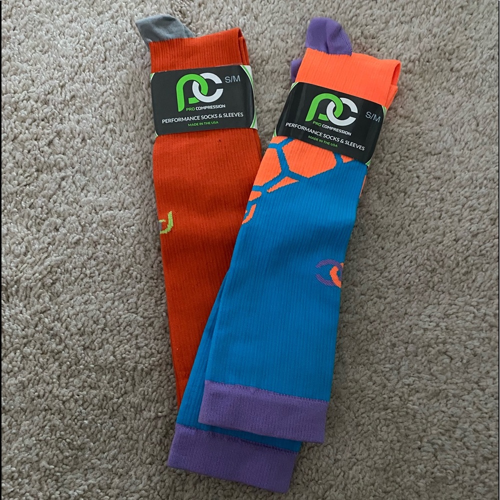 Two pairs of pro compression socks